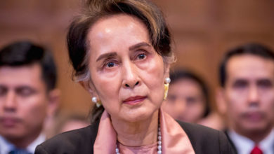 Photo of Suu Kyi Faces Court As Britain Targets Military Business